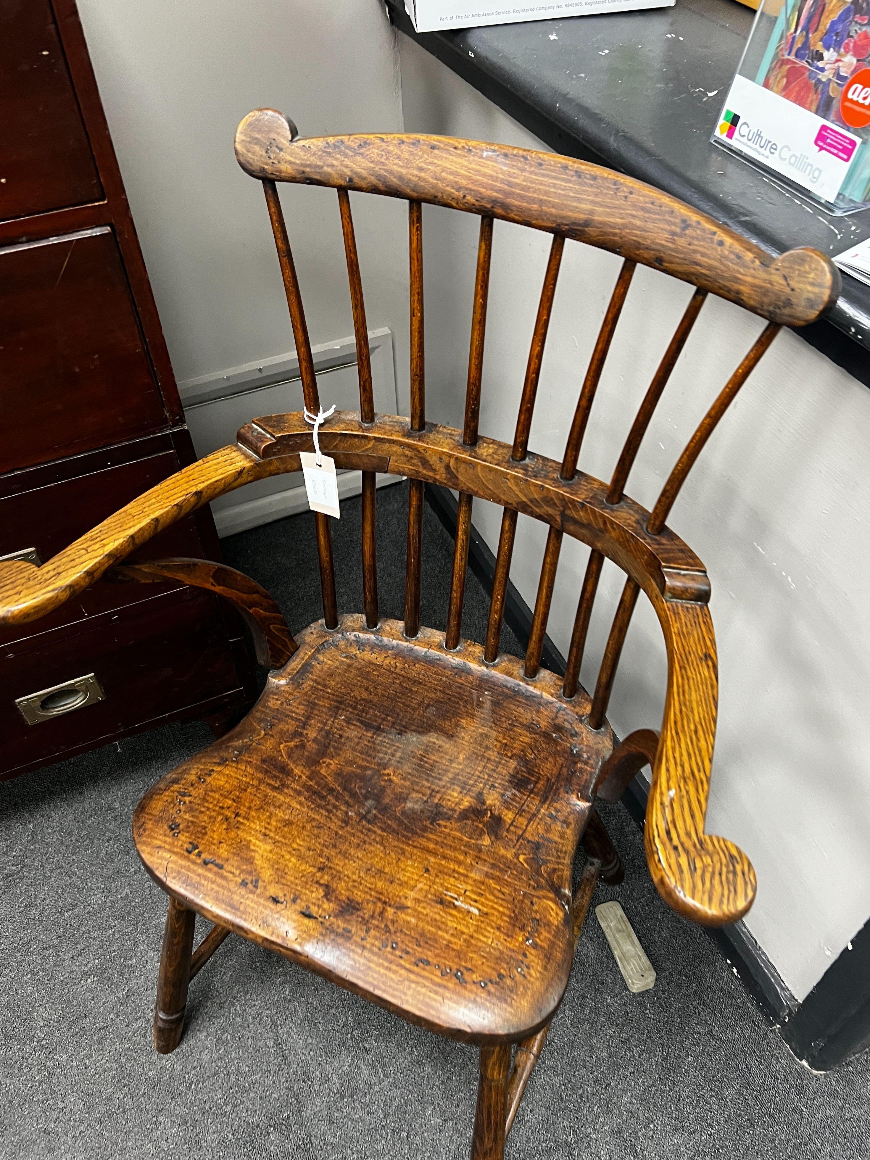 A mid 19th century and later Windsor comb back elbow chair, width 64cm, depth 39cm, height 97cm